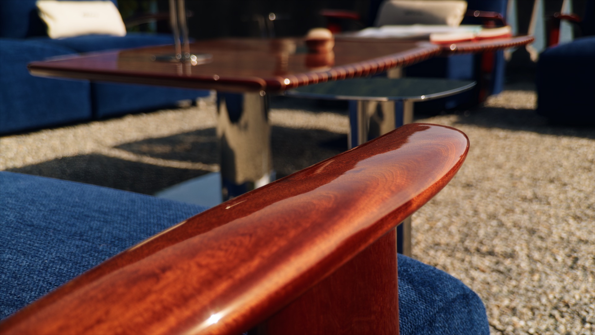 Polished wooden armrest and blue cushion from Massimo Castagna’s Exteta × Riva collection