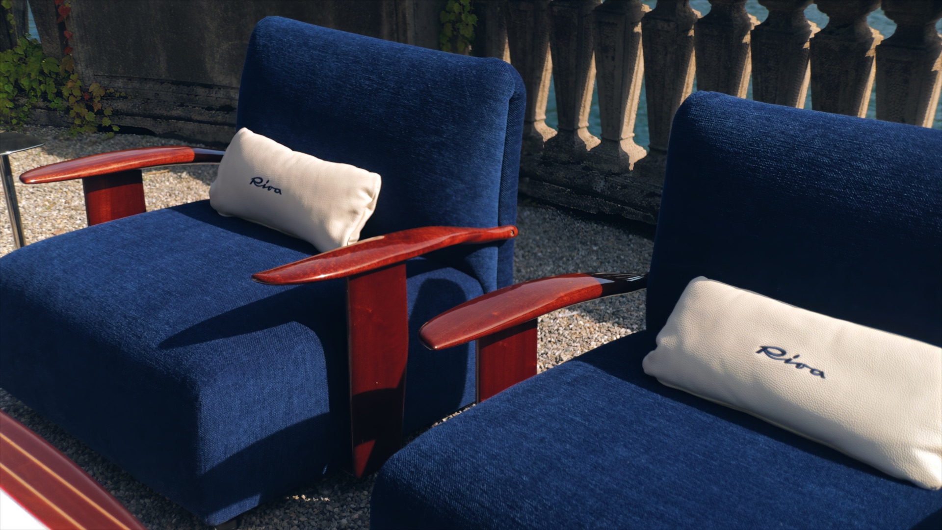 Blue Exteta × Riva armchairs by Massimo Castagna, with wooden arms and white Riva cushions